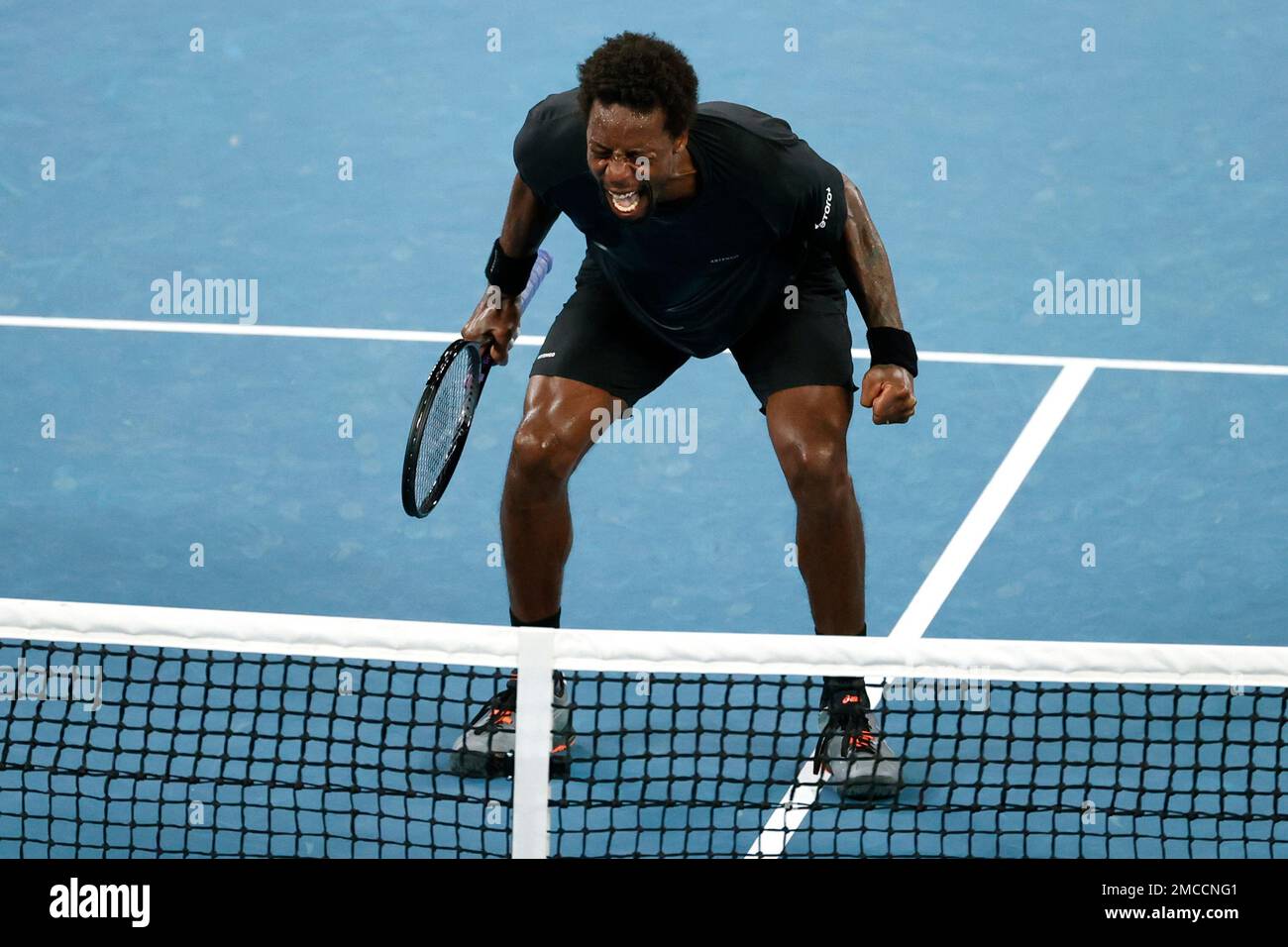 Gael Monfils of France celebrates after defeating Miomir Kecmanovic of Serbia in their fourth round match at the Australian Open tennis championships in Melbourne, Australia, Sunday, Jan