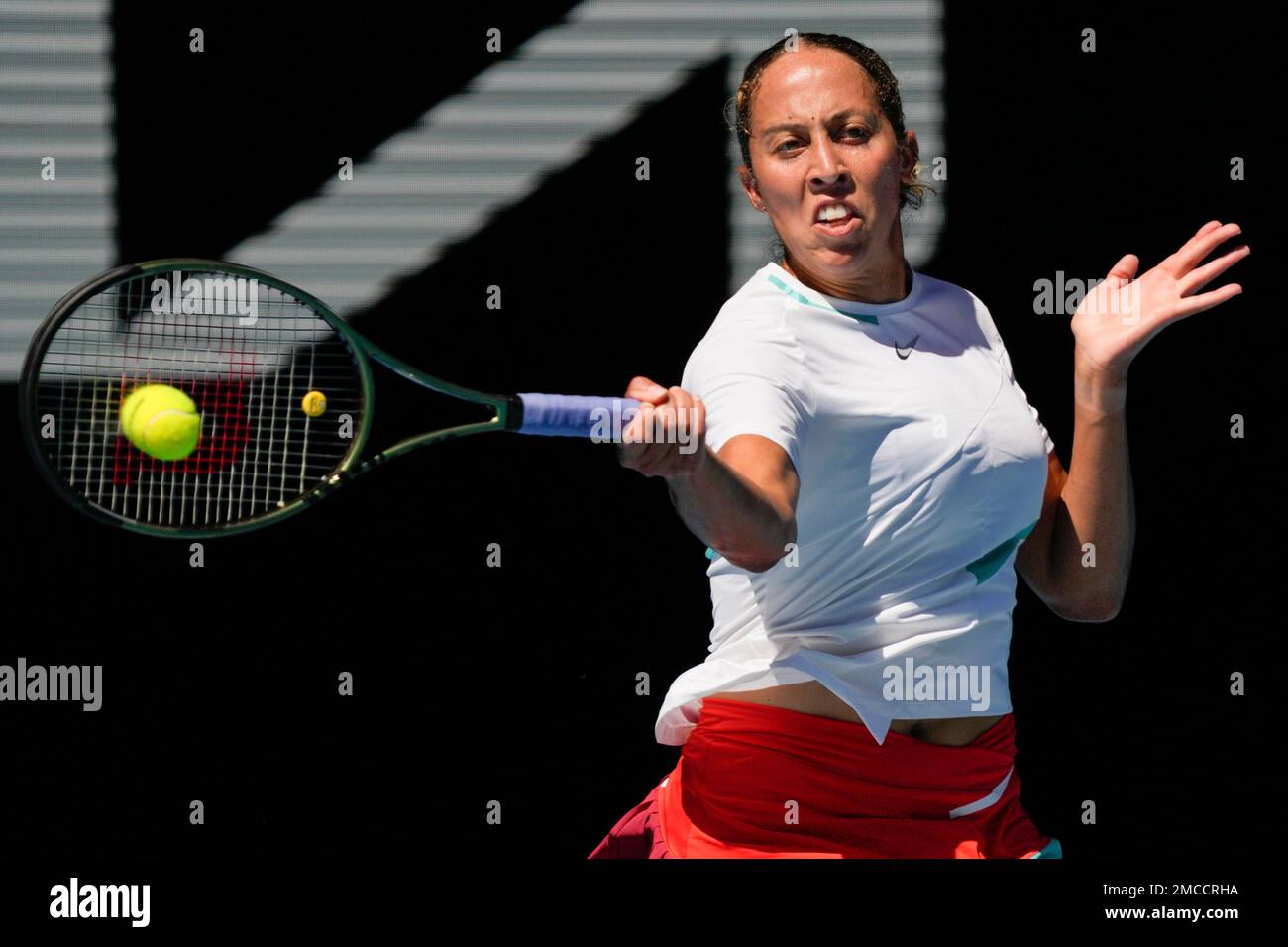 Madison Keys of the U.S. plays a forehand return to Paula Badosa of Spain during their fourth round match at the Australian Open tennis championships in Melbourne, Australia, Sunday, Jan. 23, 2022. (AP Photo/Simon Baker) Stock Photo