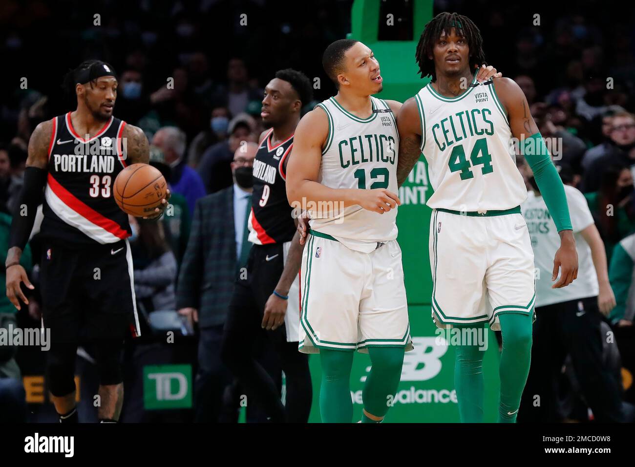 Boston Celtics' Grant Williams (12) talks with Robert Williams III 