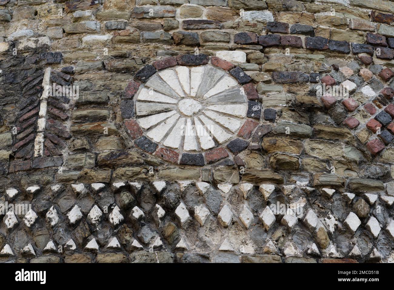 details of the mosaic work on a tower of the historical roman city wall in cologne Stock Photo