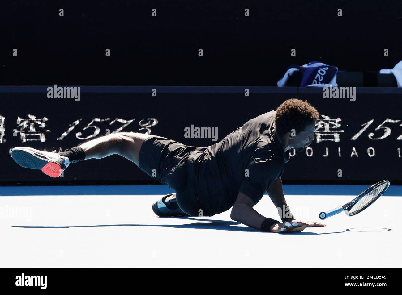 Monf Gael Monfils of France falls during his third round match against ...