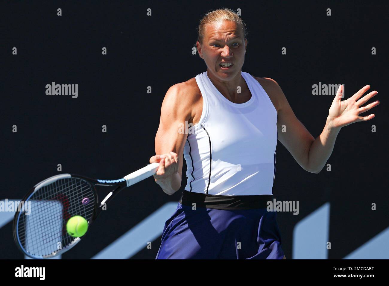 Kaia Kanepi of Estonia plays a forehand return to Marie Bouzkova of the Czech Republic during their second round match at the Australian Open tennis championships in Melbourne, Australia, Thursday, Jan