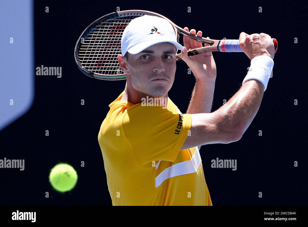 Christopher O'Connell of Australia plays a backhand return to Diego ...
