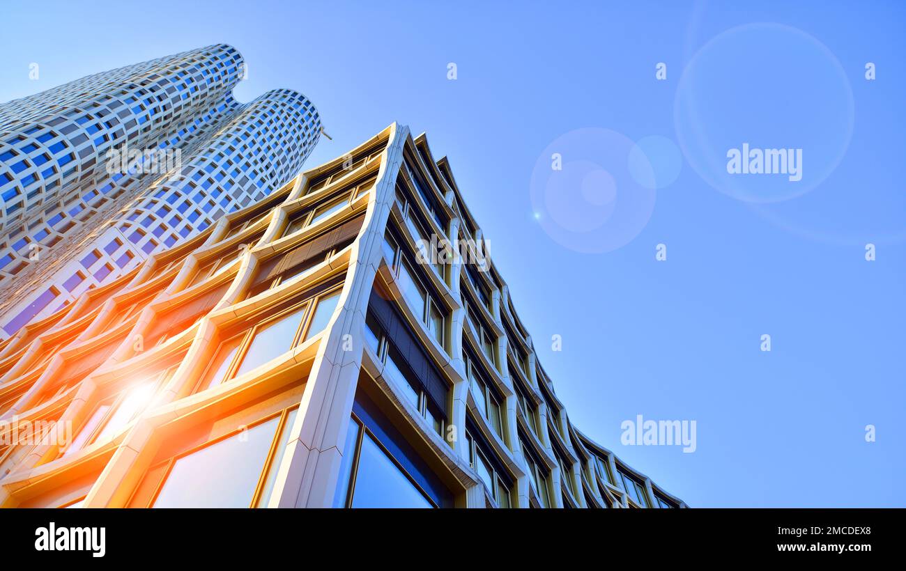 Abstract closeup of the glass-clad facade of a modern building covered ...