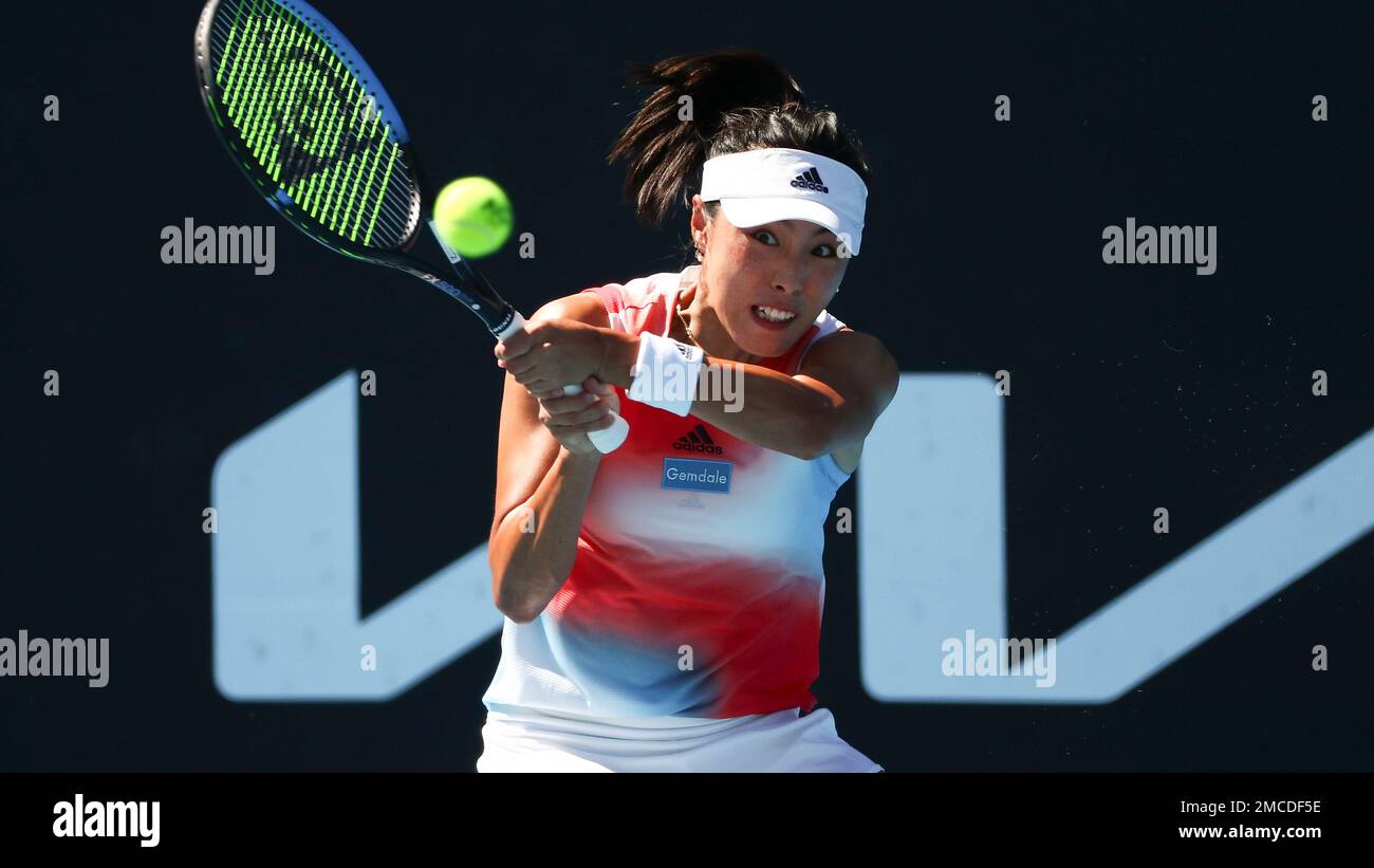 Wang Qiang of China plays a backhand return to Alison Van Uytvanck of Belgium during their second round match at the Australian Open tennis championships in Melbourne, Australia, Wednesday, Jan