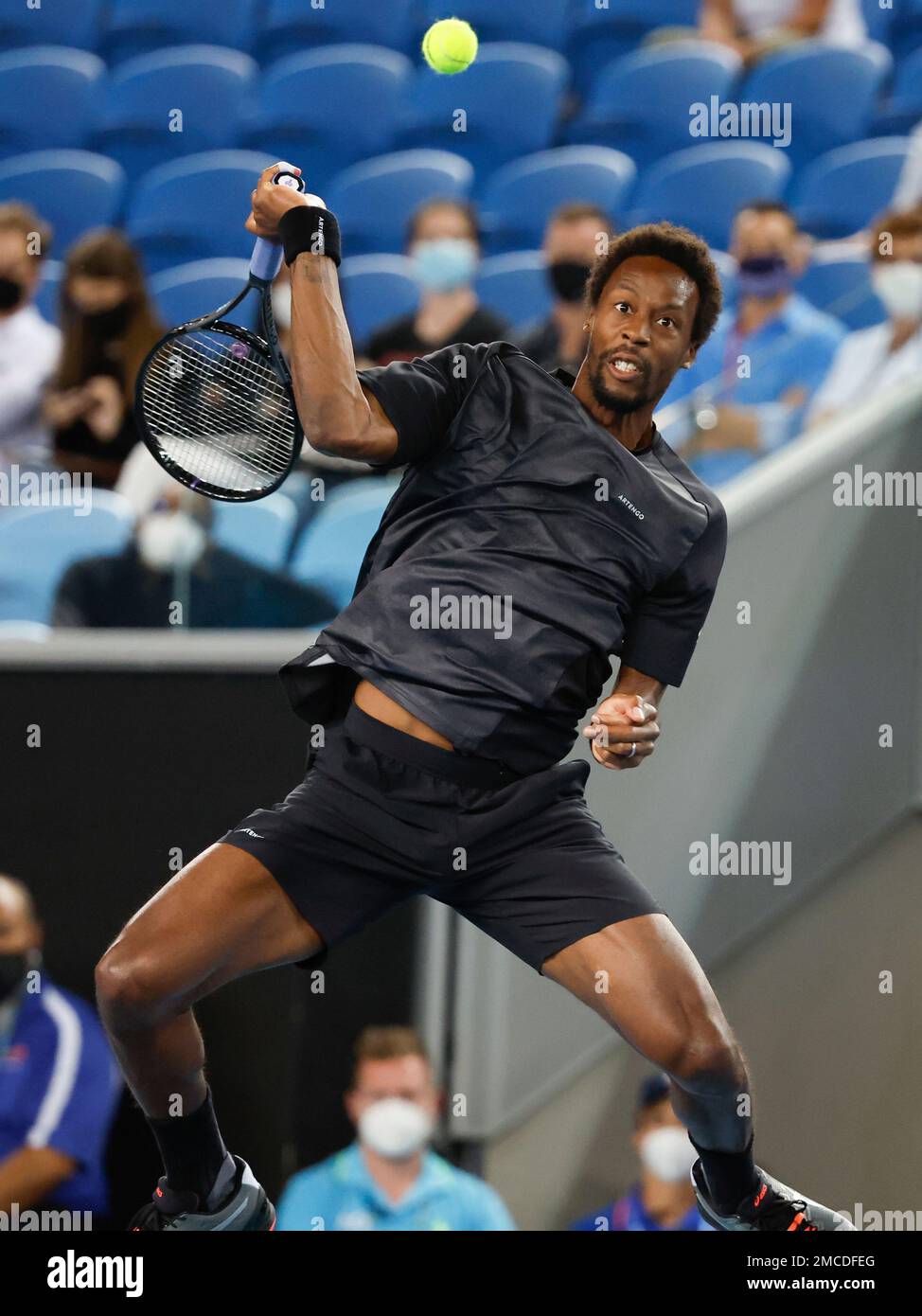 Gael Monfils of France plays a forehand return to Alexander Bublik of Ukraine during their second round match at the Australian Open tennis championships in Melbourne, Australia, Wednesday, Jan