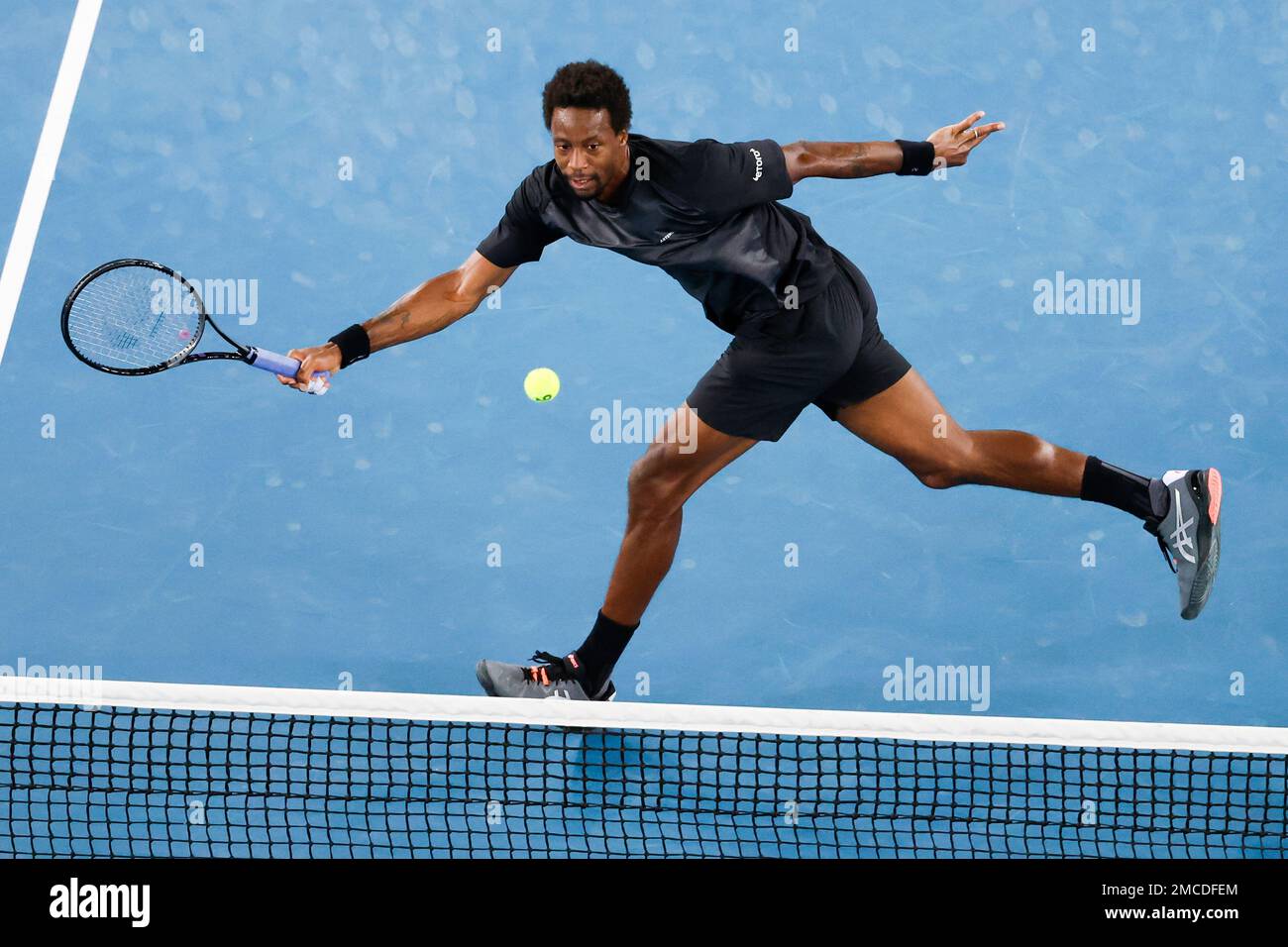 Gael Monfils of France plays a forehand return to Alexander Bublik of Ukraine during their second round match at the Australian Open tennis championships in Melbourne, Australia, Wednesday, Jan