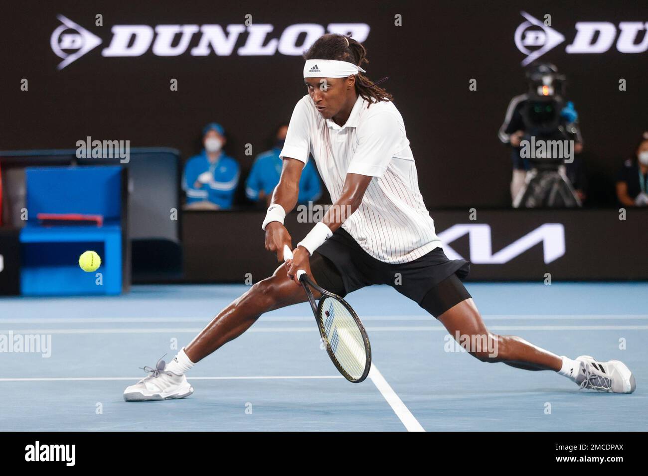 Mikael Ymer of Sweden plays a backhand return to Stefanos Tsitsipas of Greece during their first round match at the Australian Open tennis championships in Melbourne, Australia, Tuesday, Jan