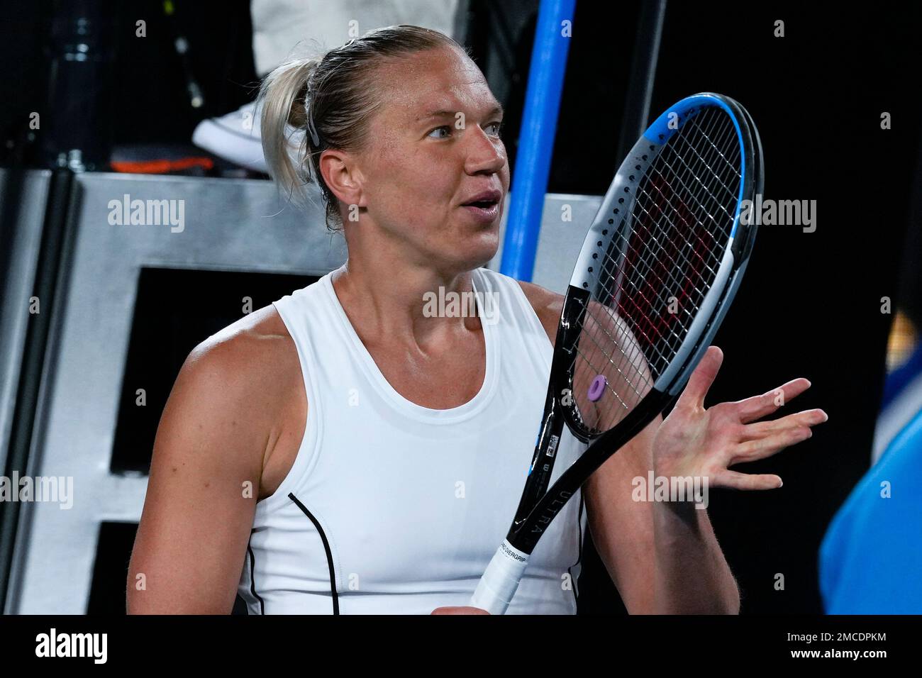 Kaia Kanepi of Estonia reacts after defeating Angelique Kerber of Germany in their first round match at the Australian Open tennis championships in Melbourne, Australia, Tuesday, Jan