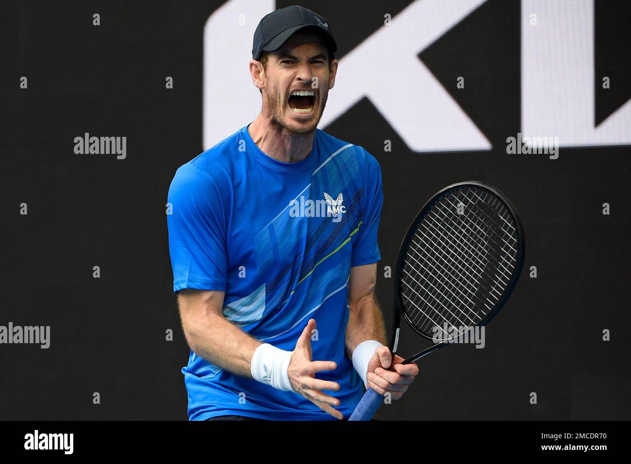 Andy Murray of Britain reacts after winning a point against Nikoloz Basilashvili of Georgia during their first round match at the Australian Open tennis championships in Melbourne, Australia, Tuesday, Jan