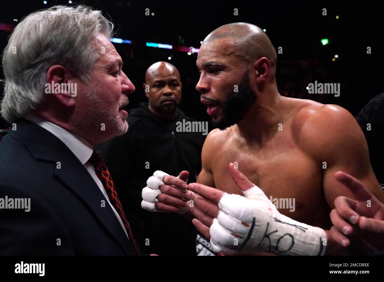 Robert Smith, secretary general of the British Boxing Board of Control, orders Chris Eubank Jr back to the changing rooms following defeat at the AO Arena, Manchester. Picture date: Saturday January 21, 2023. Stock Photo