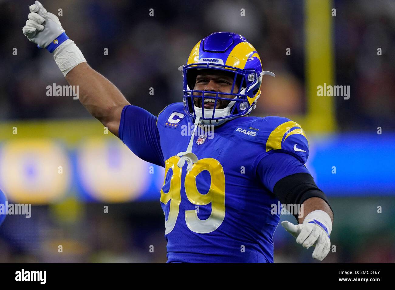 Los Angeles Rams defensive end Aaron Donald (99) celebrates during the  first half of an NFL wild-card playoff football game against the Arizona  Cardinals in Inglewood, Calif., Monday, Jan. 17, 2022. (AP