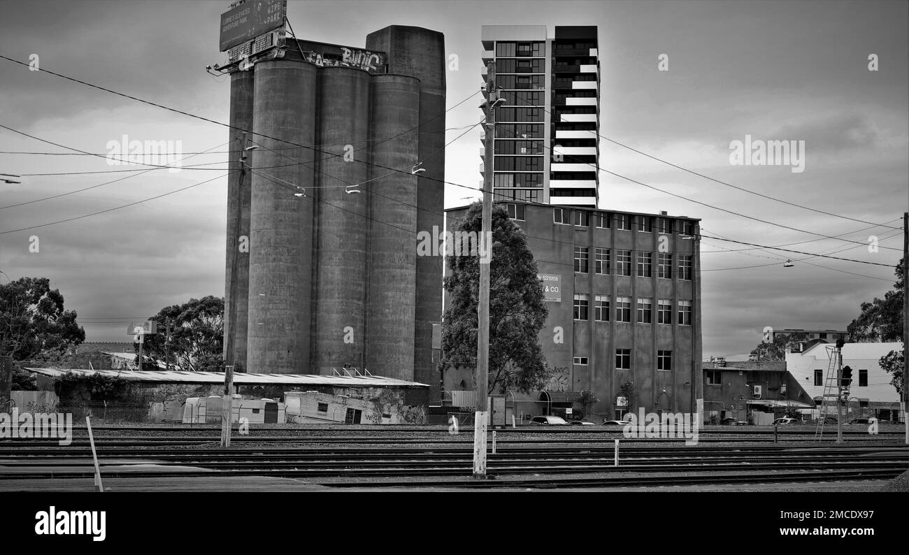 City scape, Geelong, Victoria, Australia, Train station, train line, grain silos, old world, modern architecture, black and white Stock Photo