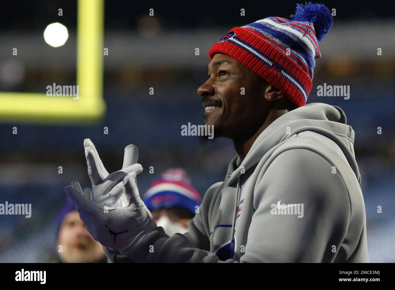Buffalo Bills wide receiver Stefon Diggs plays rockpaperscissors with a fan before an NFL wild