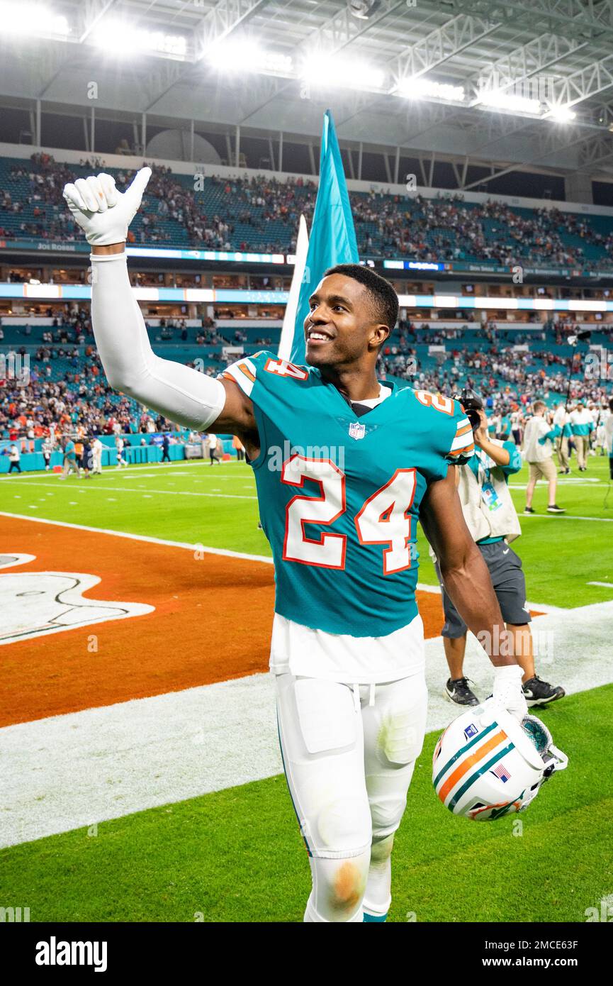 Miami Dolphins cornerback Byron Jones (24) smiles and gives a thumbs up