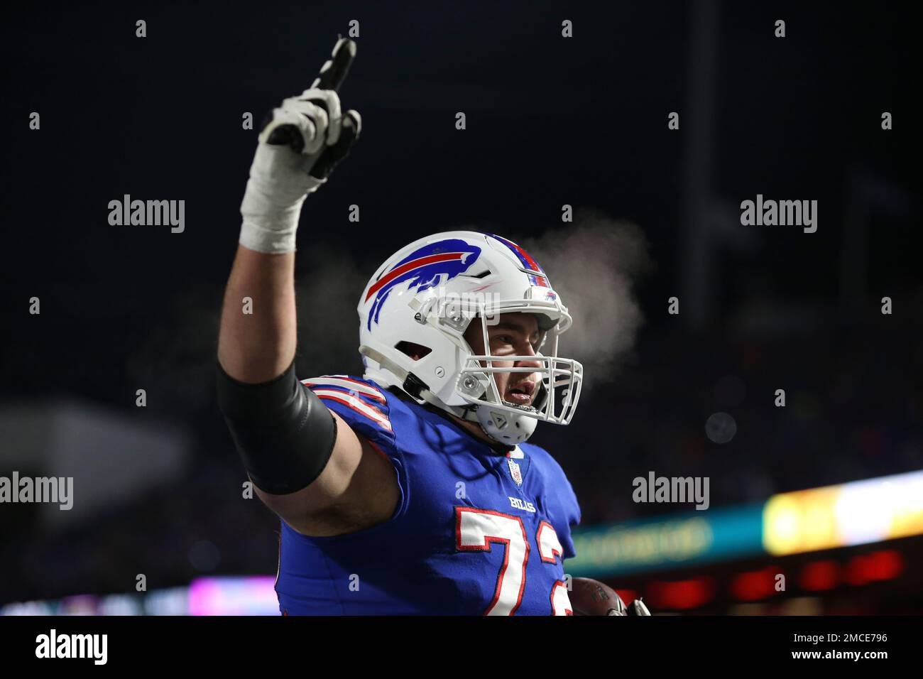 Buffalo Bills offensive tackle Tommy Doyle (72) reacts after