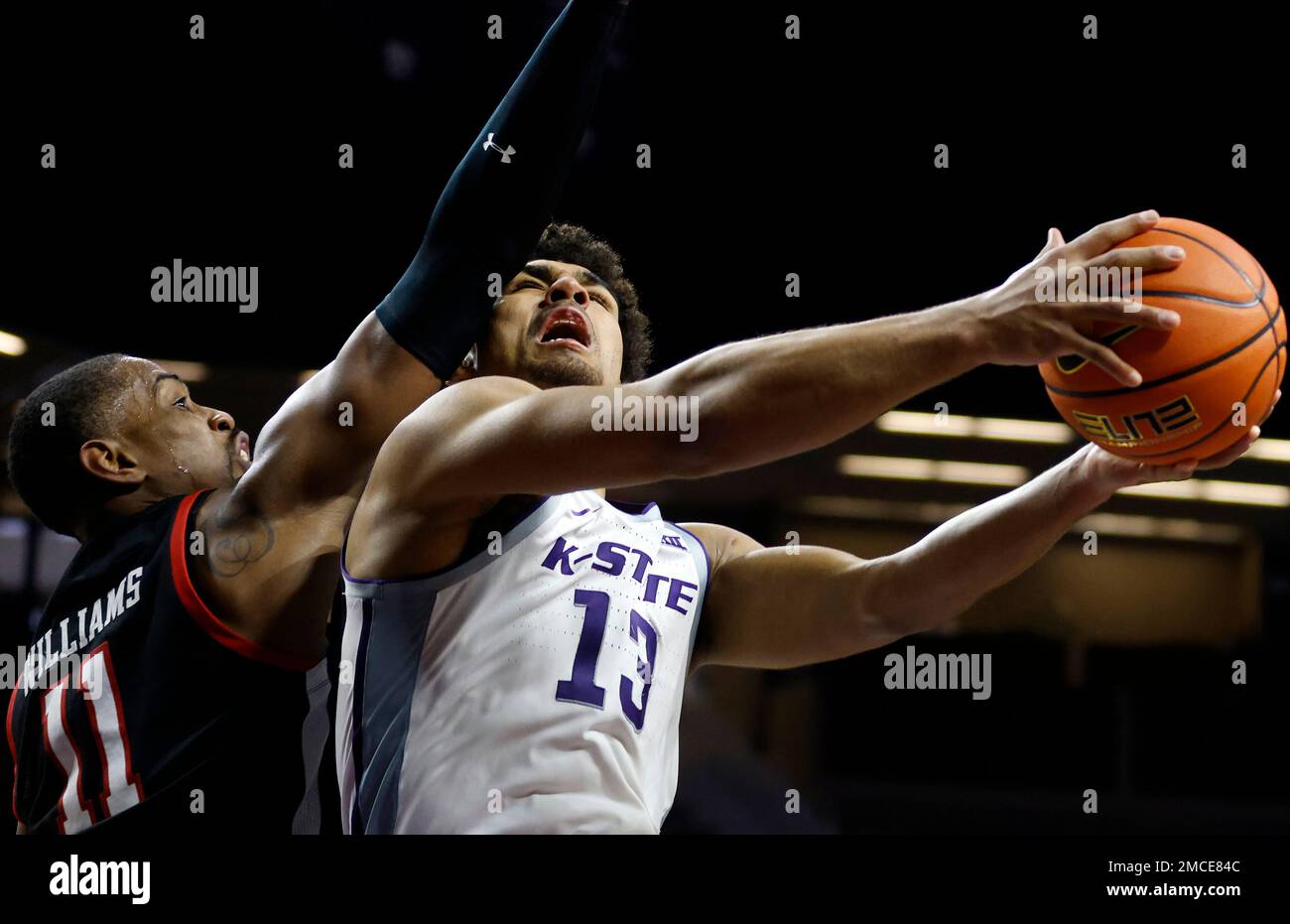 Kansas State guard Mark Smith (13) attempts to score against Texas Tech