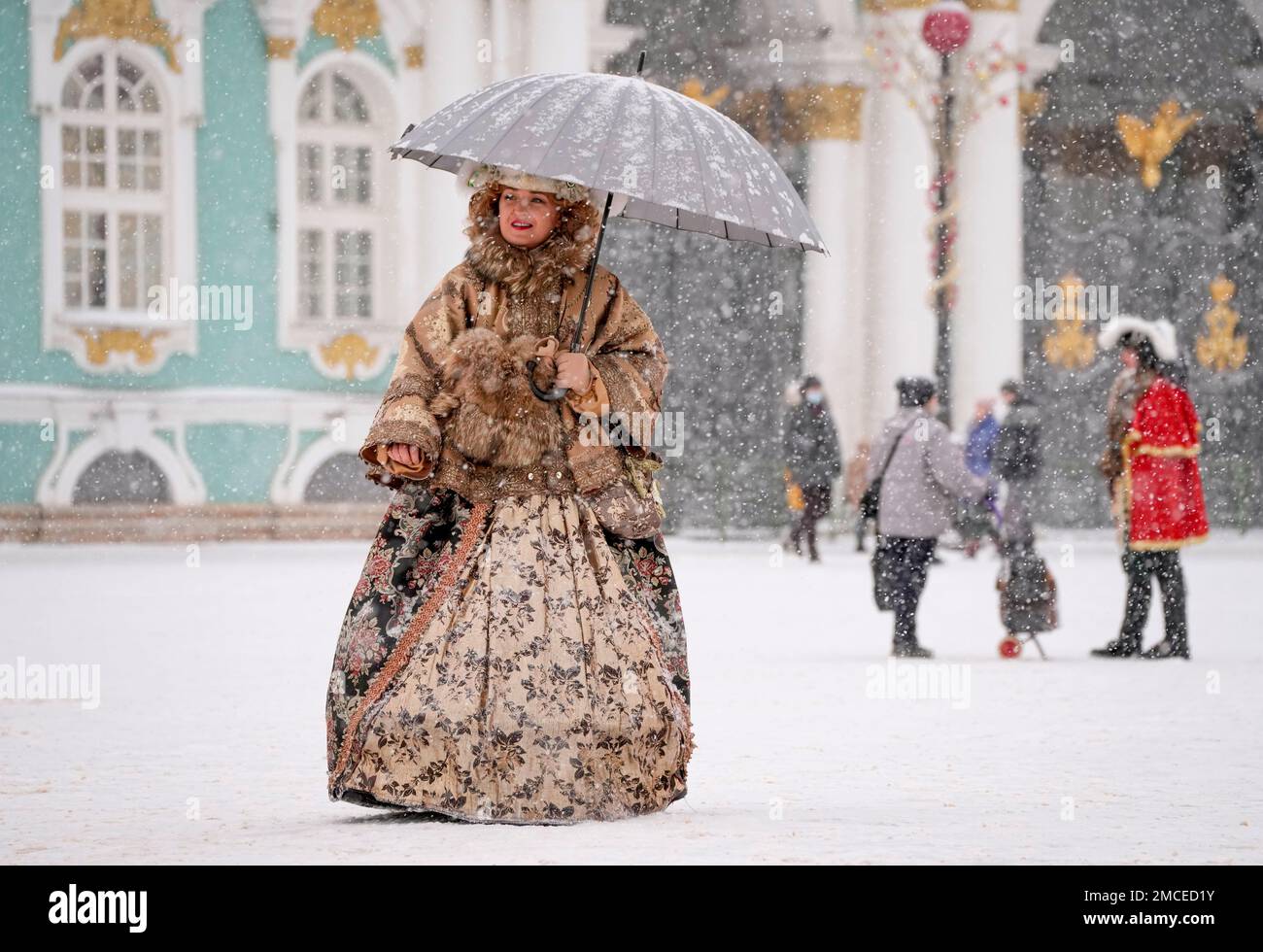 A street actress wearing 18th century styled clothes, walks in snowfall in  central St. Petersburg, Russia, Sunday, Jan. 9, 2022. (AP Photo/Dmitri  Lovetsky Stock Photo - Alamy