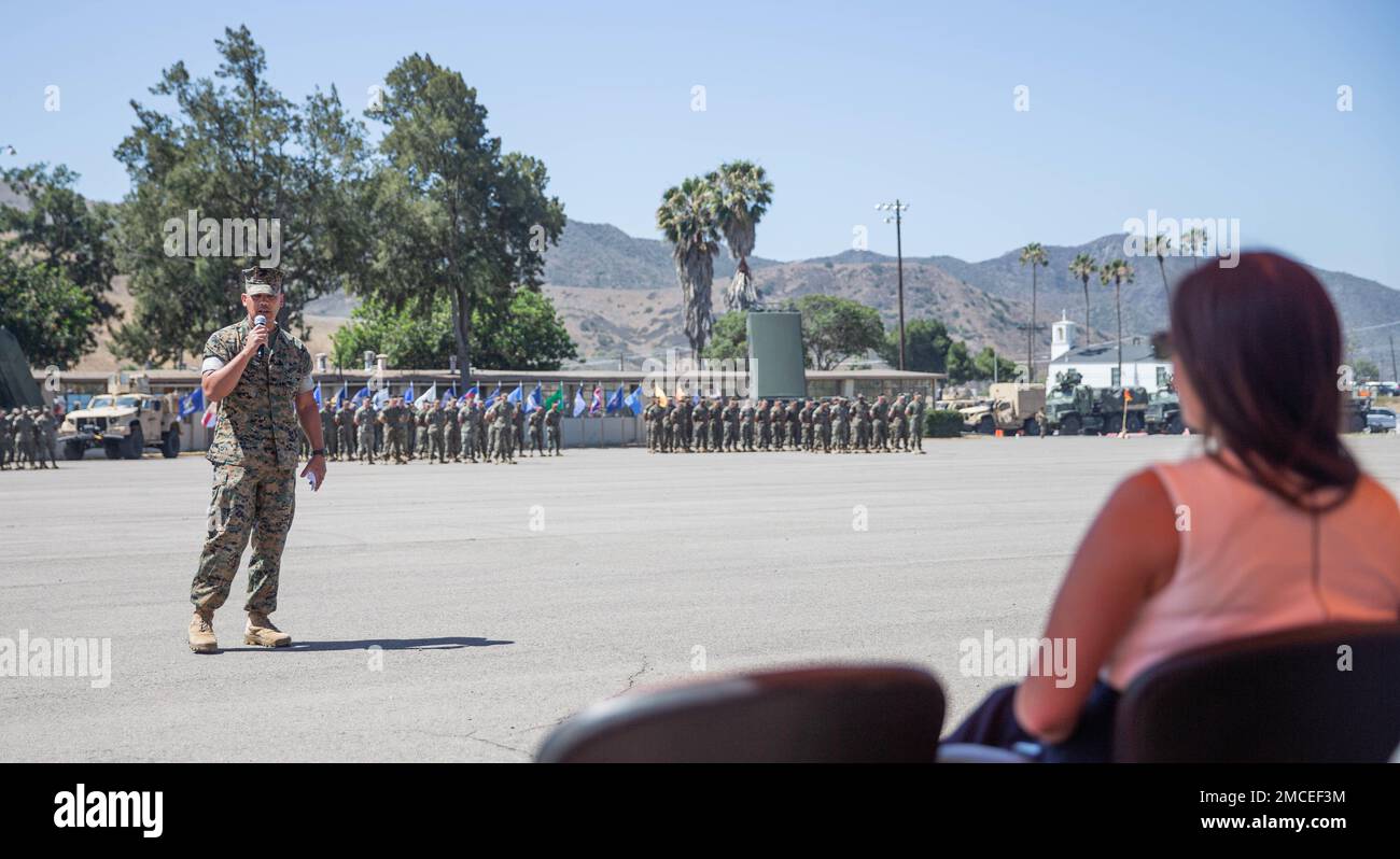 U.S. Marine Corps Col. Daniel Skuce, the outgoing commanding officer of 11th Marine Regiment, 1st Marine Division, thanks his wife for her support during a change of command ceremony at Marine Corps Base Camp Pendleton, California, June 30, 2022. During the ceremony, Skuce relinquished command of 11th Marine Regiment to Col. Patrick Eldridge. Stock Photo