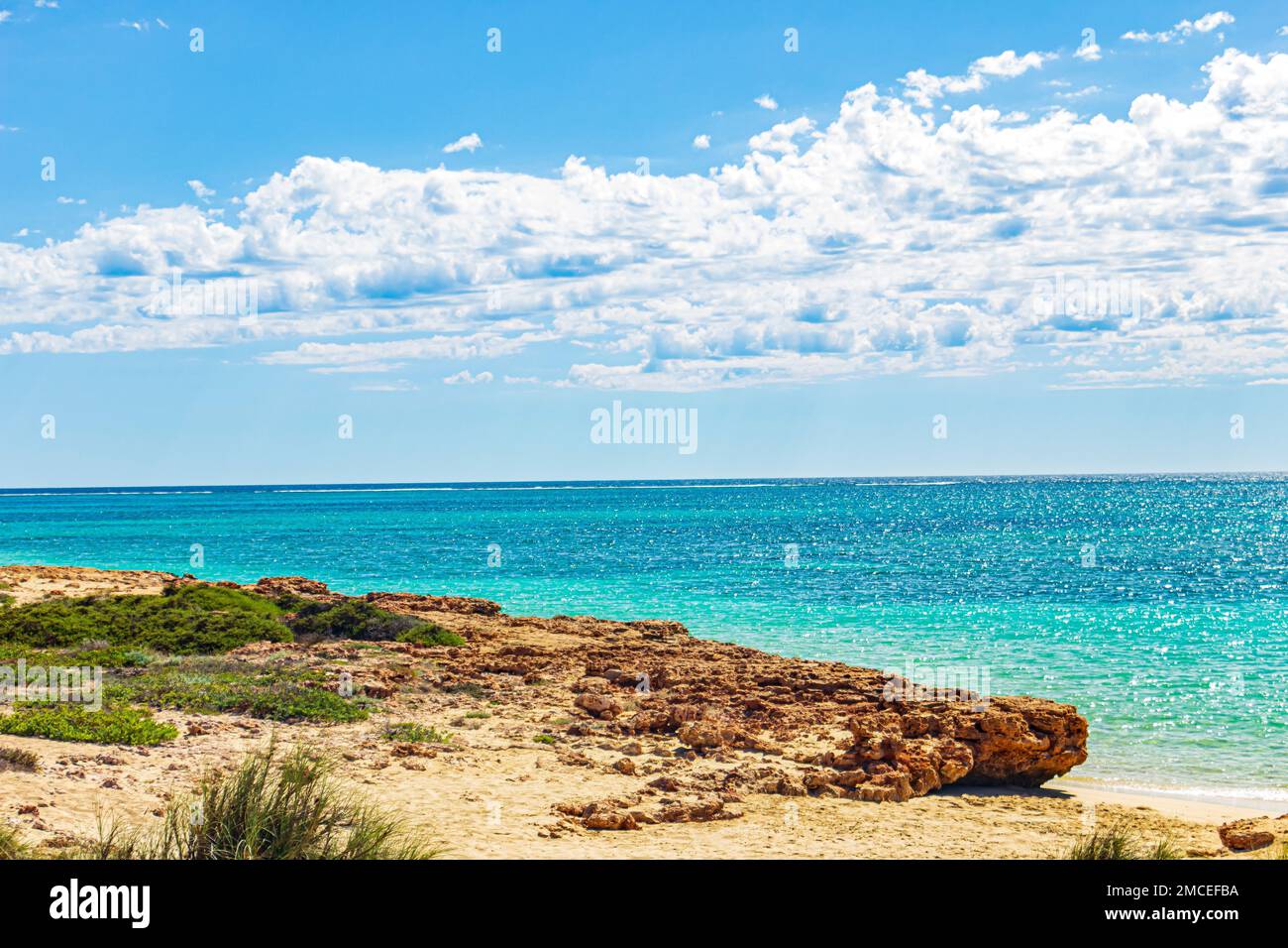Rugged and wild beach at Osprey Bay in Cape Range National Park if Western Australia's Coral