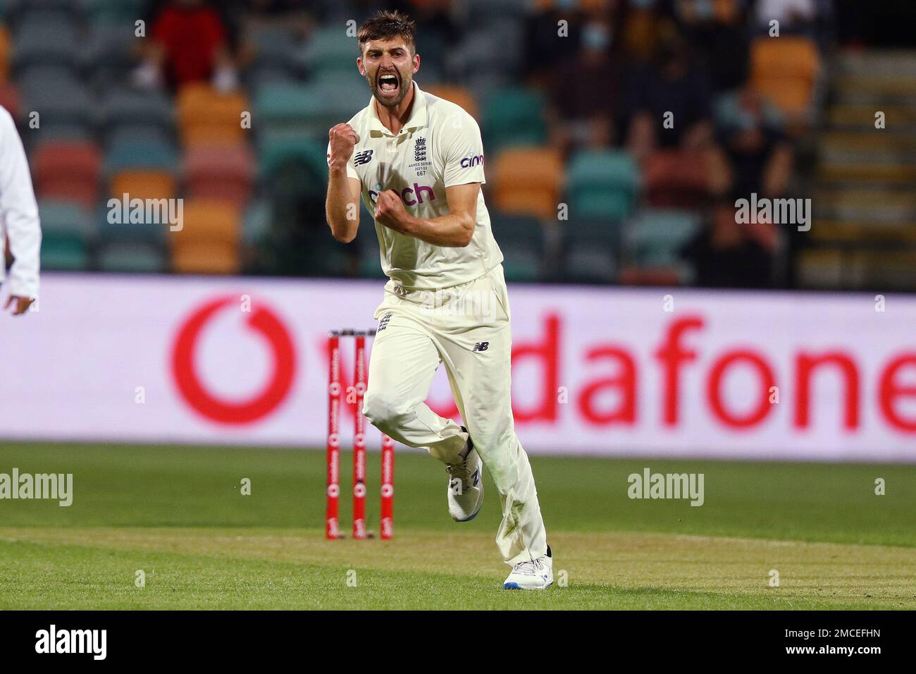 England's Mark Wood celebrates taking the wicket of Australia's Cameron Green during their Ashes cricket test match in Hobart, Friday, Jan. 14, 2022. (AP Photo/Tertius Pickard) Stock Photo