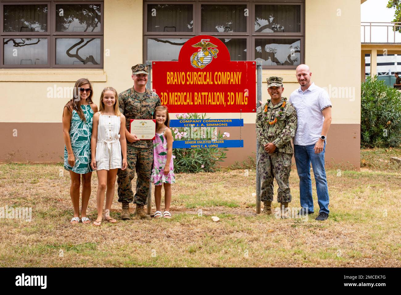 U.S. Navy Hospital Corpsman 2nd Class Edward J. Cochrane, left, a field