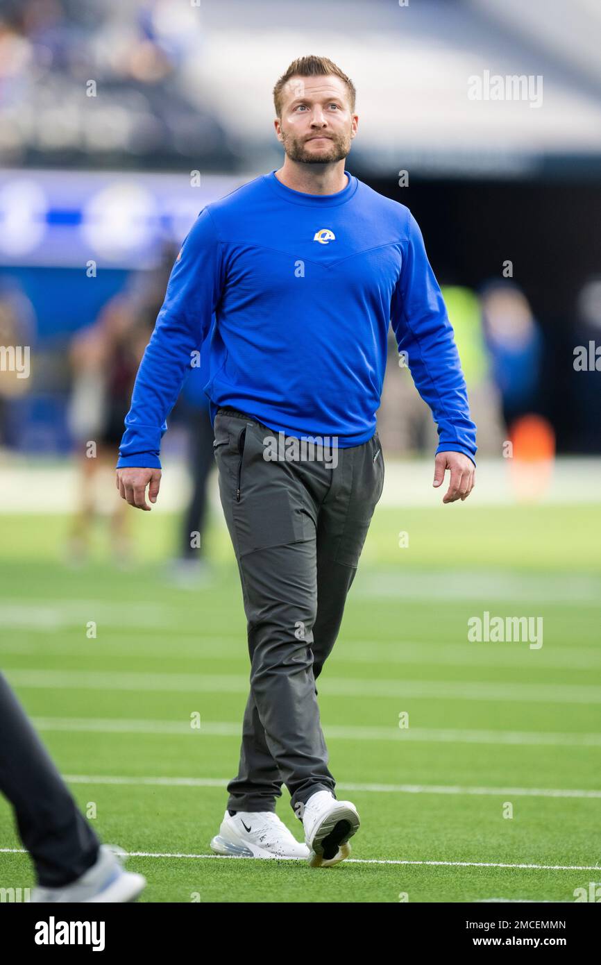 Los Angeles Rams head coach Sean McVay watches his players warm up