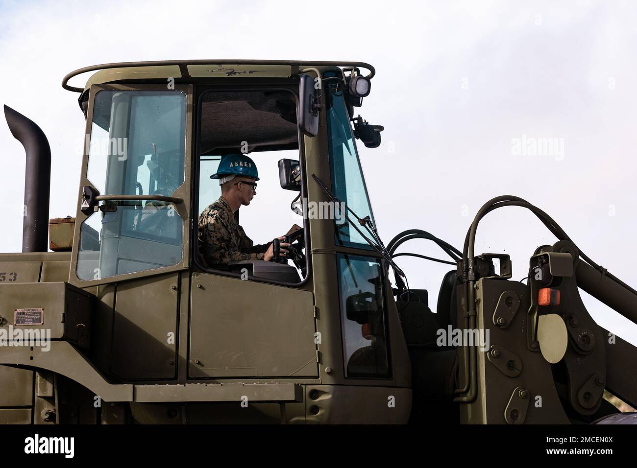U.S. Marine Corps Lance Cpl. Jacob Griffeth, an engineer equipment operator with Combat Logistics Battalion 31, 31st Marine Expeditionary Unit, operates a MMV All-Terrain Forklift during a foreign humanitarian assistance exercise at Camp Hansen, Okinawa, Japan, June 30, 2022. The FHA was conducted to test the Marines’ abilities to interact and aid humanitarian needs while promoting regional stability and security. The 31st MEU, the Marine Corps’ only continuously forward-deployed MEU, provides a flexible and lethal force ready to perform a wide range of military operations as the premiere cris Stock Photo