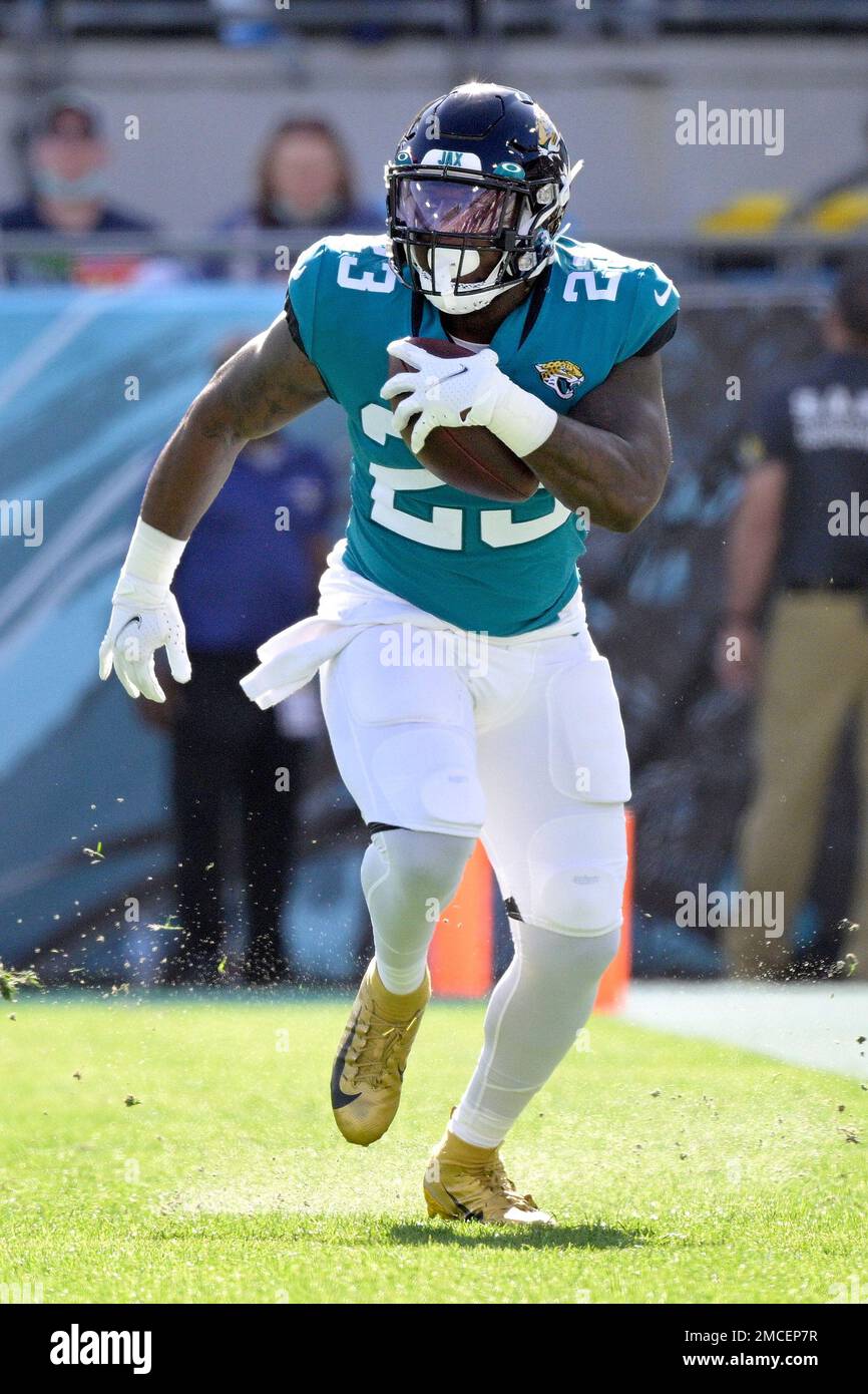 Jacksonville Jaguars running back Ryquell Armstead (23) runs after catching  a pass during the first half of an NFL football game against the  Indianapolis Colts, Sunday, Jan. 9, 2022, in Jacksonville, Fla. (