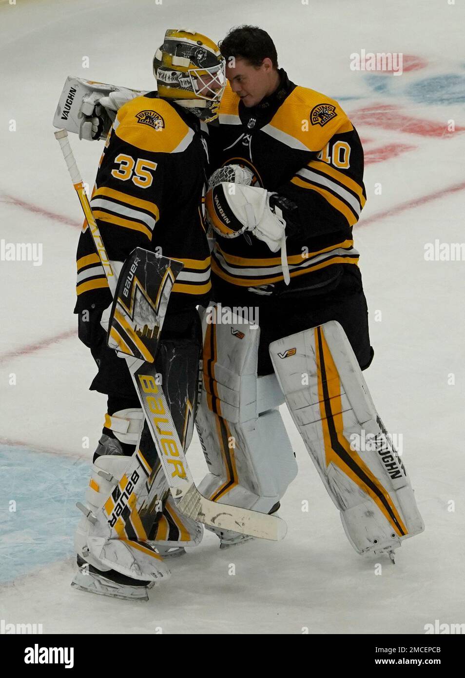 Boston Bruins goaltender Linus Ullmark (35) is congratulated by teammate Tuukka  Rask (40) after defeating the Montreal Canadiens in an NHL hockey game,  Wednesday, Jan. 12, 2022, in Boston. (AP Photo/Mary Schwalm Stock Photo -  Alamy