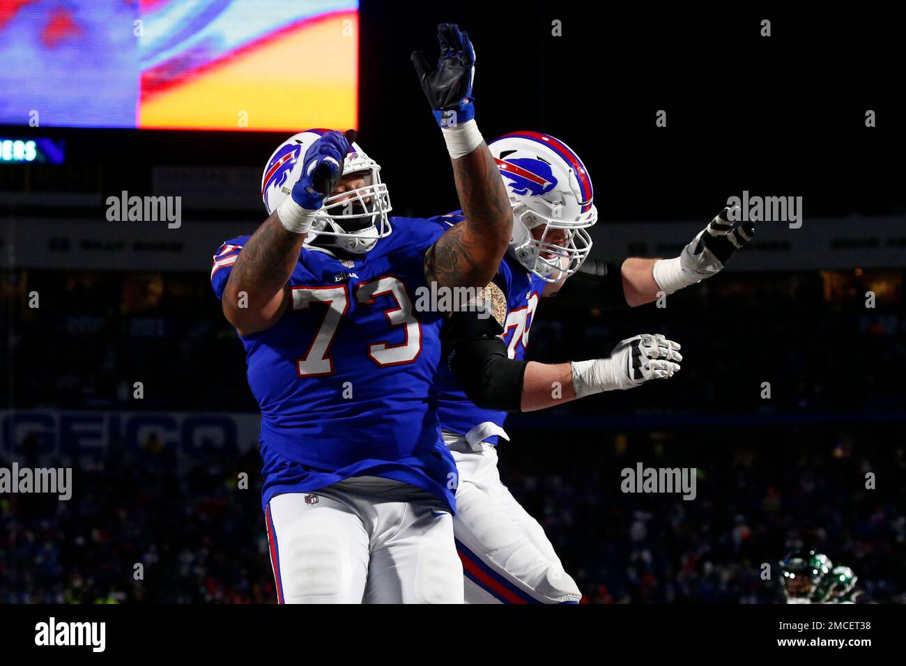 November 11, 2018 - East Rutherford, New Jersey, U.S. - Buffalo Bills  offensive tackle Dion Dawkins (73) catches a touchdown pass as New York  Jets linebacker Jeremiah Attaochu (55) tries to defend