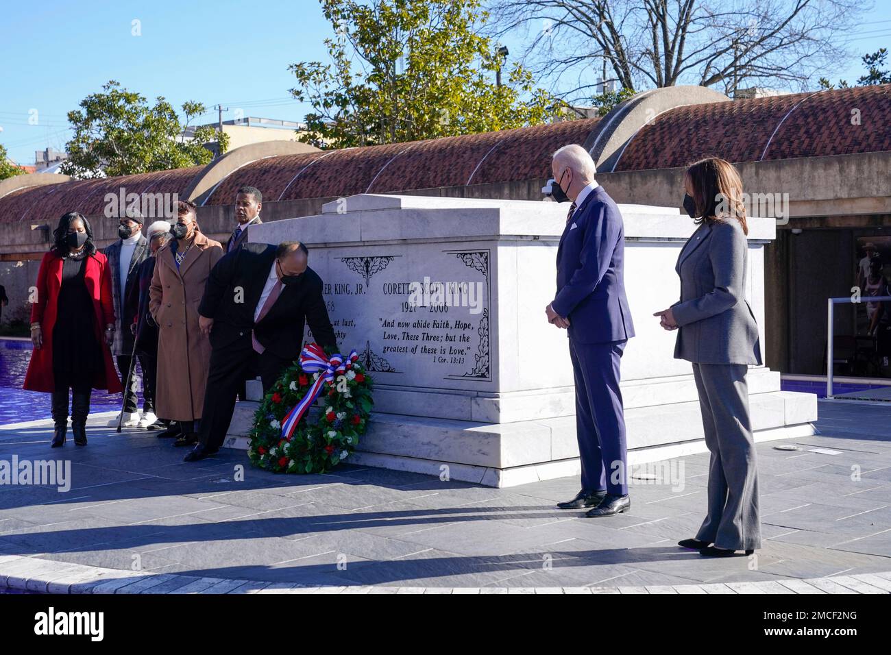 President Joe Biden and Vice President Kamala Harris watch as Martin