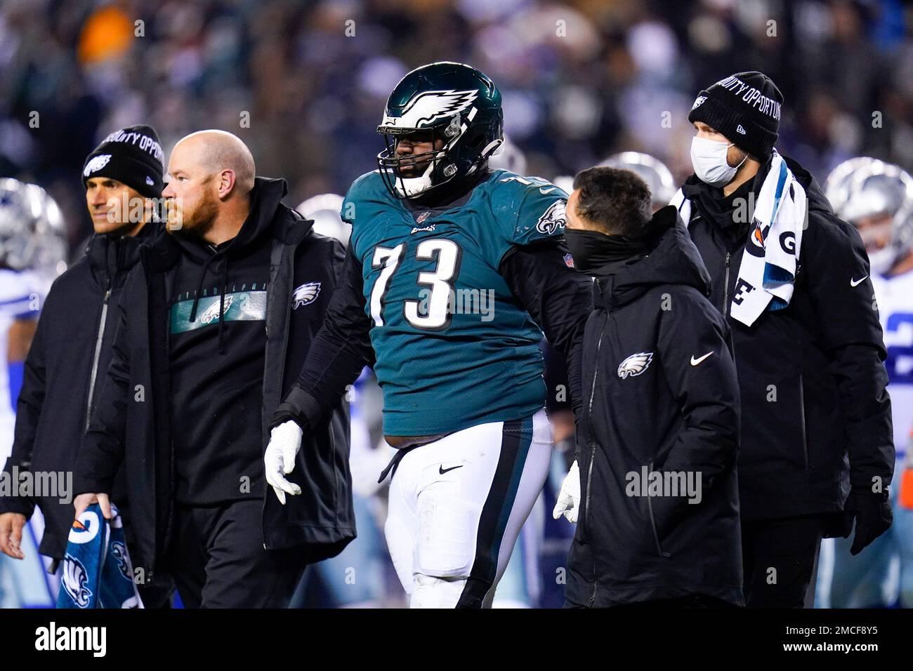 Philadelphia Eagles defensive tackle Marvin Wilson walks with medical staff  during the second half of an NFL football game between the Philadelphia  Eagles and the Dallas Cowboys, Monday, Jan. 10, 2022, in