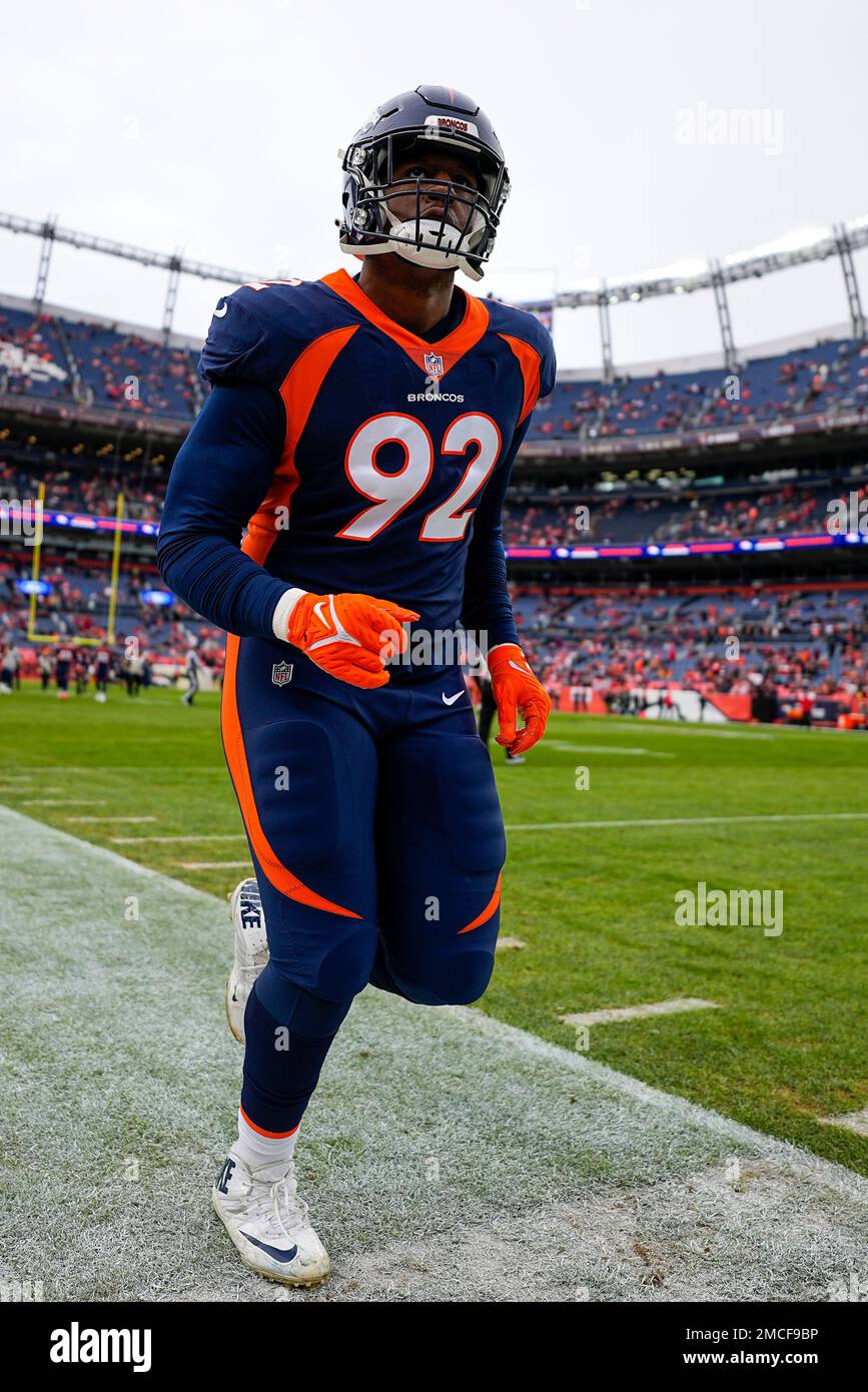 Denver Broncos defensive lineman Jonathan Harris (92) plays against the  Tennessee Titans during the first half of an NFL football game Sunday, Nov.  13, 2022, in Nashville, Tenn. (AP Photo/Mark Zaleski Stock