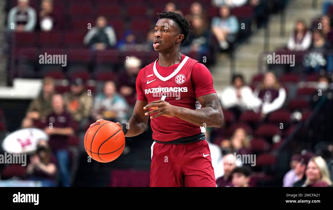 Arkansas guard Davonte Davis (4) setups up the offense against Texas A