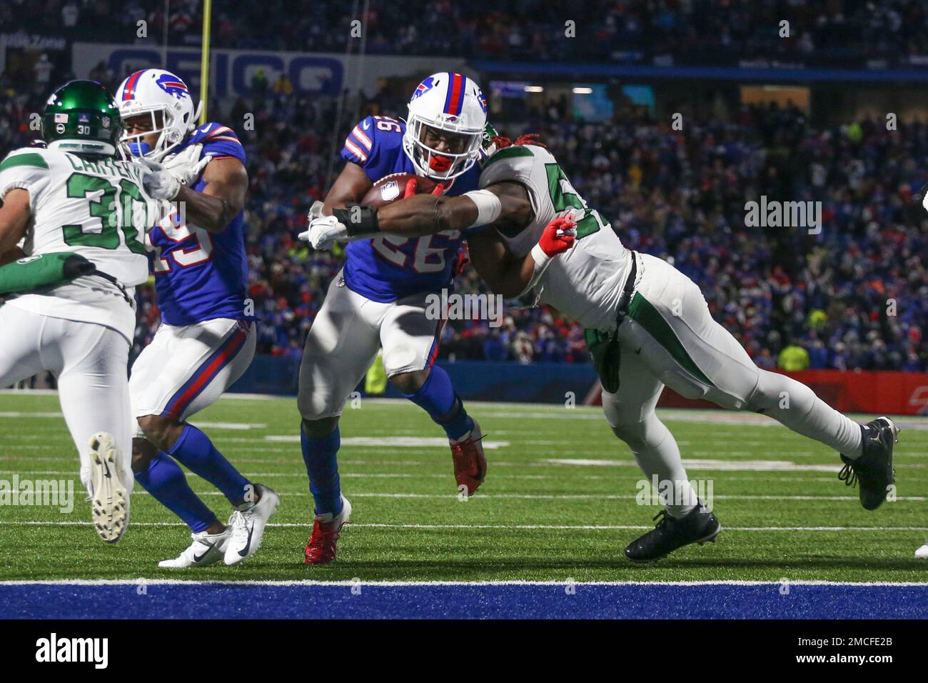 Buffalo Bills' Devin Singletary (26) scores a touchdown during the second  half of an NFL football