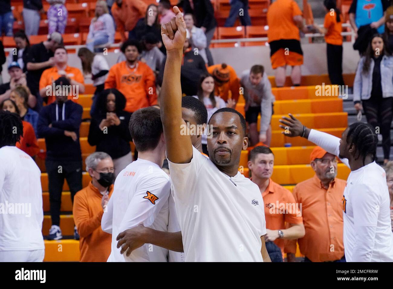 Oklahoma State head coach Mike Boynton Jr. gestures to the crowd after