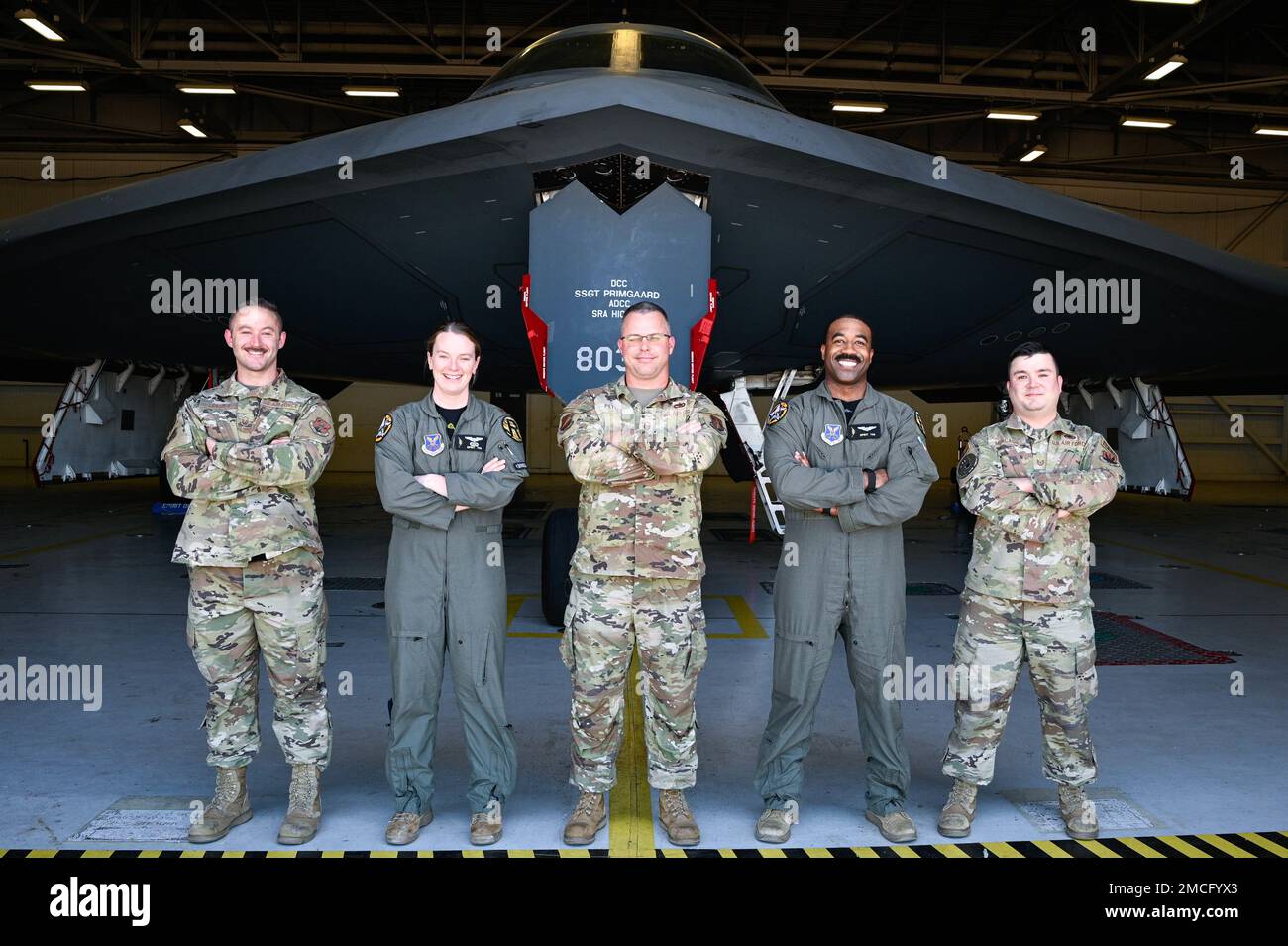 Airmen assigned to Whiteman Air Force Base stand for a photo to