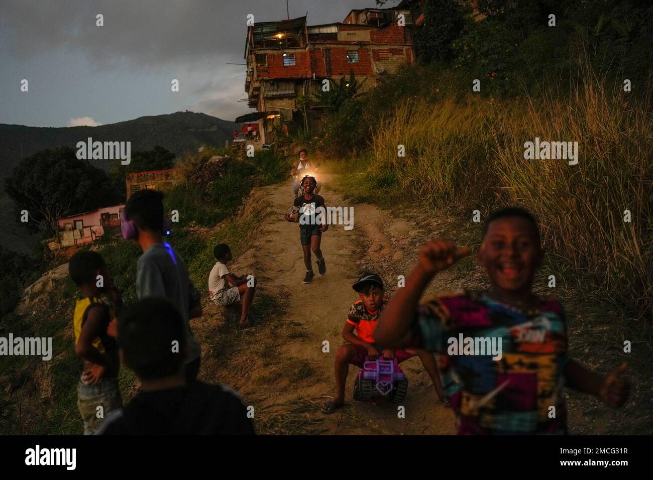 Children Play With A Soccer Ball In The Catia Neighborhood Of Caracas children-play-with-a-soccer-ball-in-the-catia-neighborhood-of-caracas