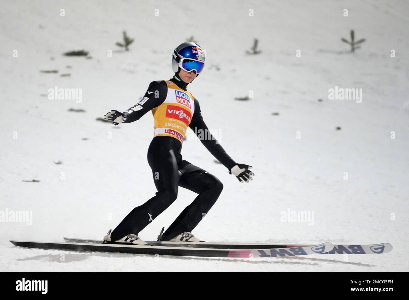 Ryoyu Kobayashi, of Japan, brakes in the finish area during his second