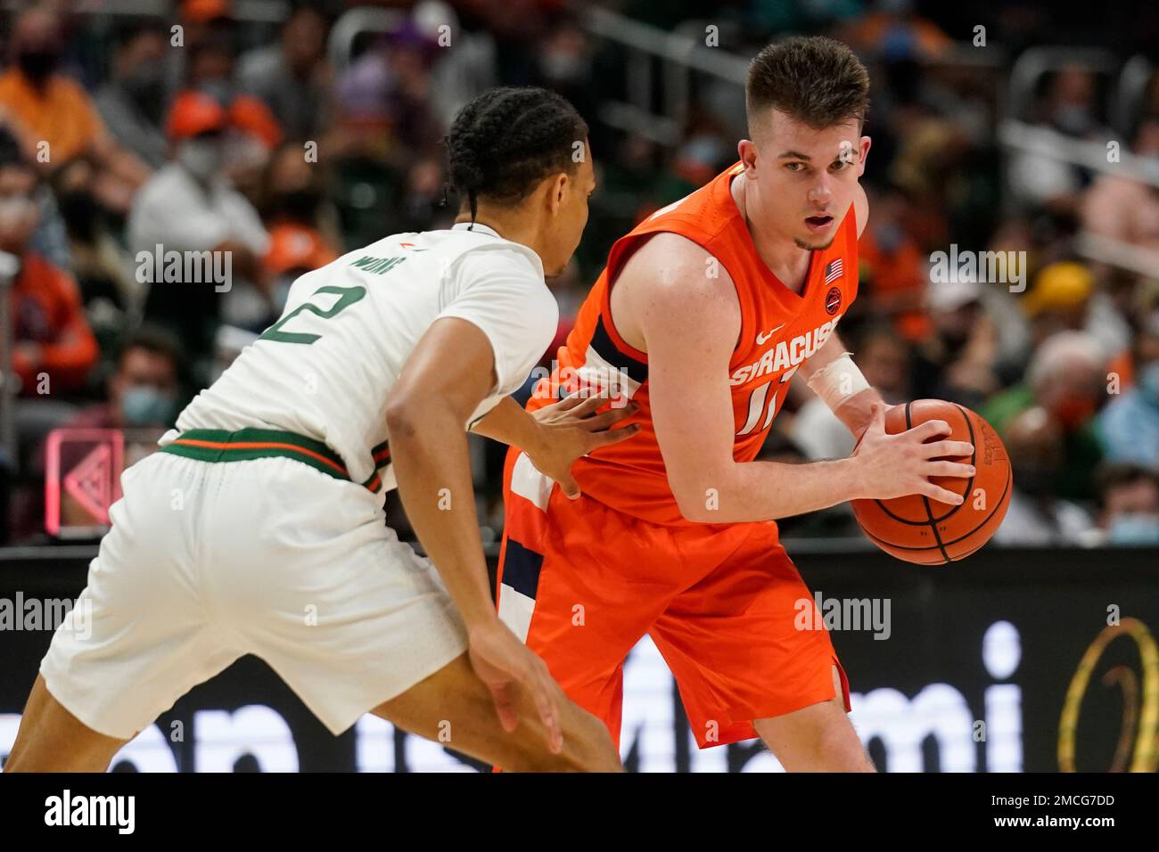 Syracuse guard Joseph Girard III (11) looks for an open teammate past