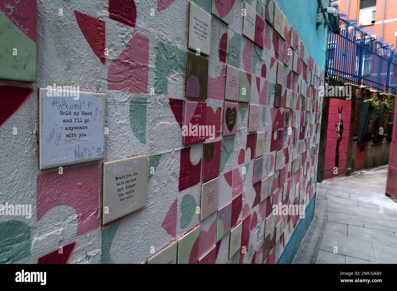 Art in a Love Lane backstreet of The Temple Bar, tiles and text / poems - Love from Dublin, hold my hand and I will go anywhere with you Stock Photo
