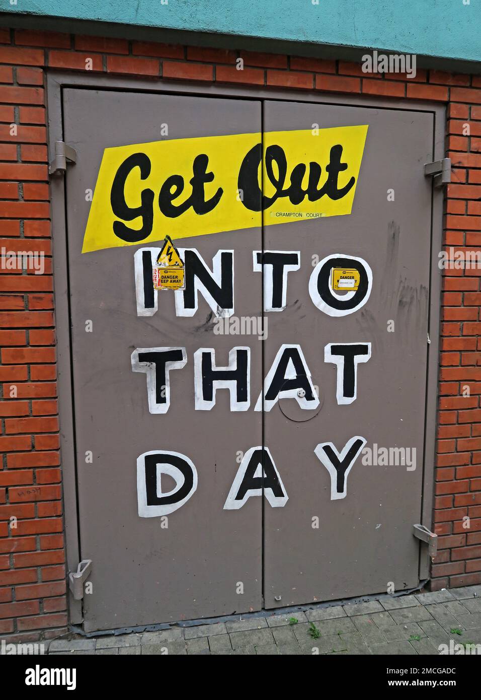 Graffiti on exit fire door - Get out into that day - Dublin Stock Photo