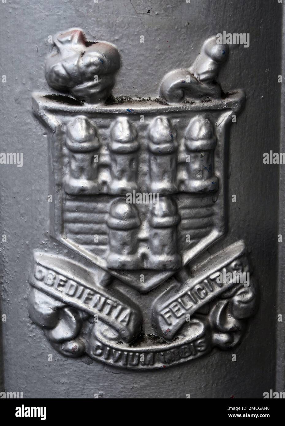 Dublin city crest, towers, castle, on a silver lamp post, Eire, Ireland - Obedientia Civium Urbis Felicitas Stock Photo