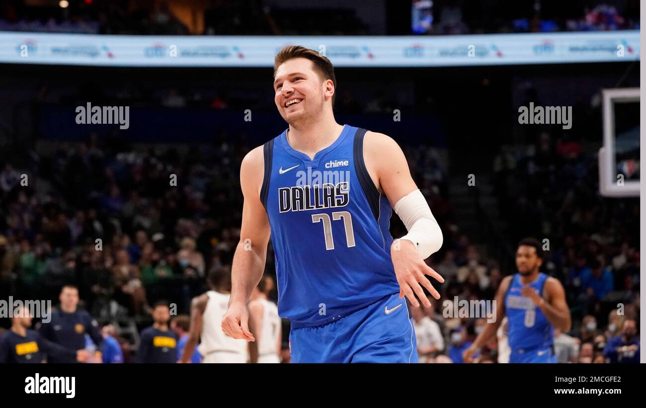 Dallas Mavericks guard Luka Doncic (77) smiles during an NBA basketball ...