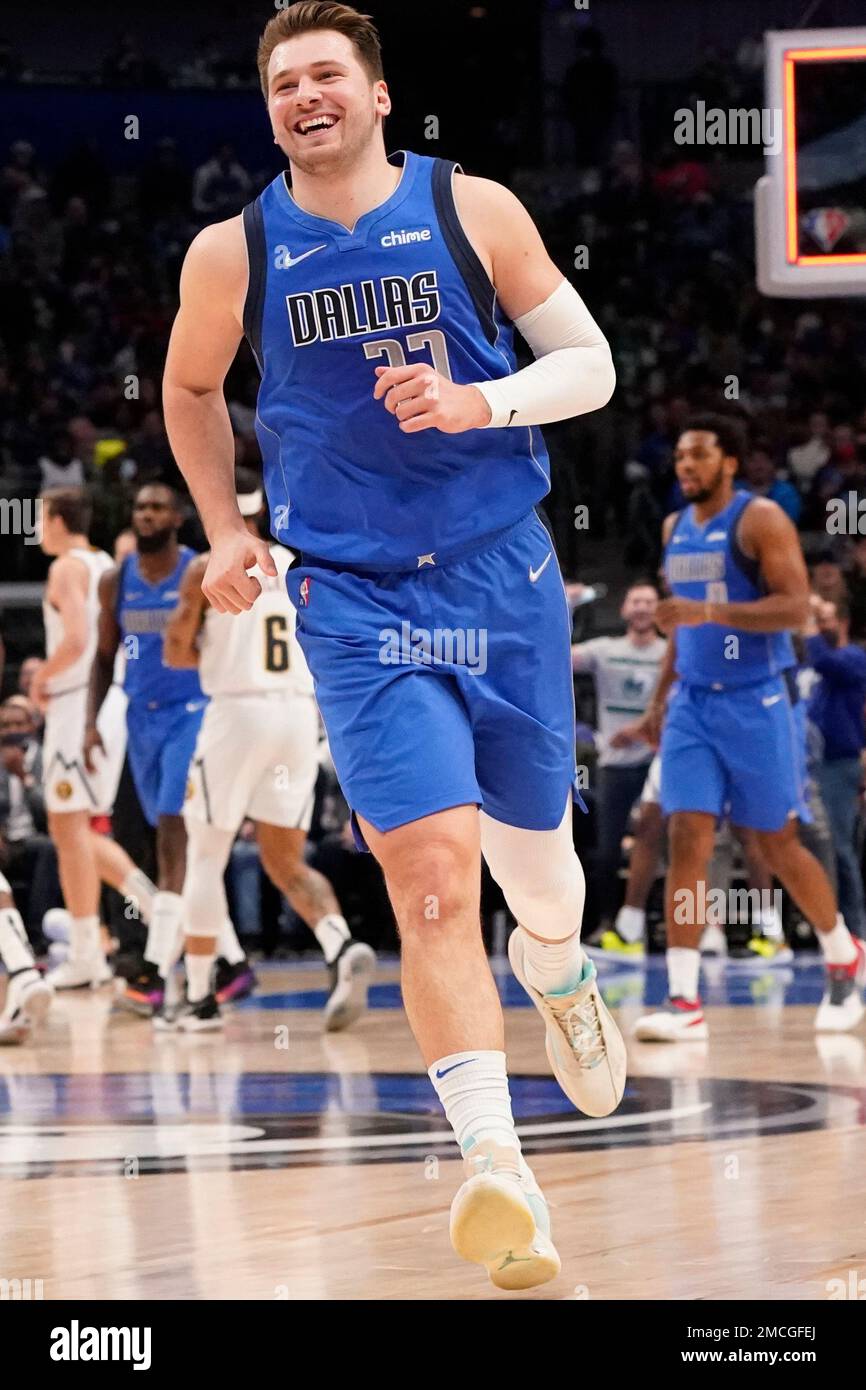 Dallas Mavericks guard Luka Doncic (77) smiles during an NBA basketball ...