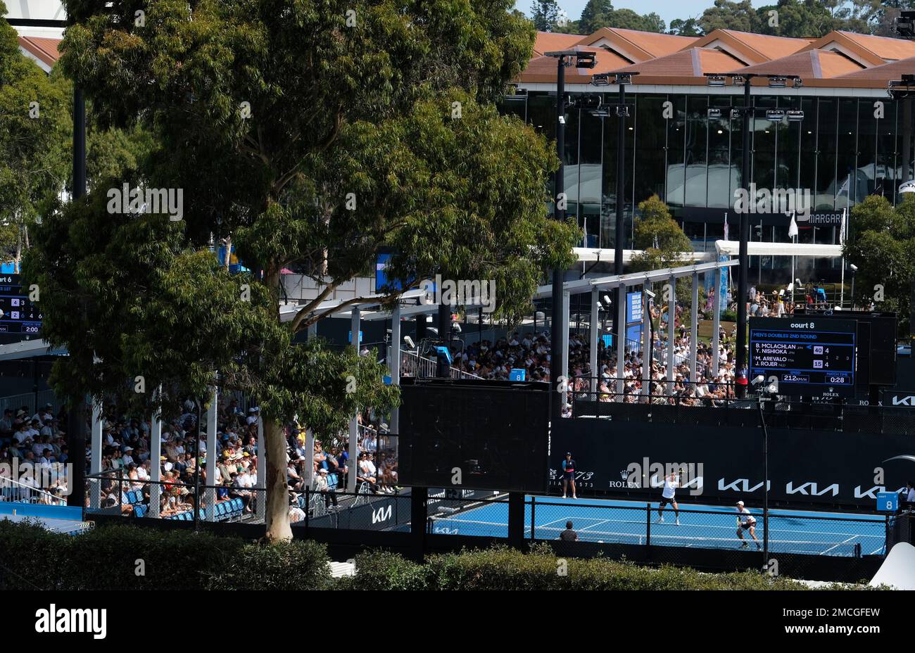 Tennis players compete in the Australian Open tennis championships, at the National Tennis