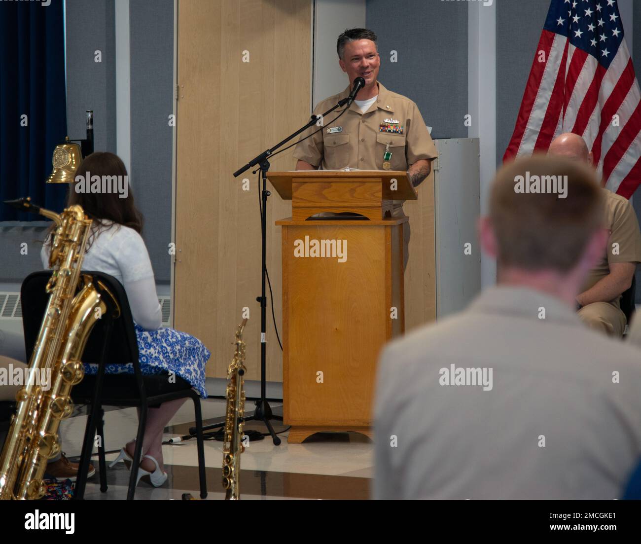 NEWPORT, R.I. (July 1, 2022) Master Chief Musician Gresh Laing gives remarks during his retirement ceremony on Naval Station Newport, July 1, 2022. The Naval School of Music plays a vital role in developing the military musician, and its graduates go on to become musical ambassadors on ships and stations throughout the world. Stock Photo