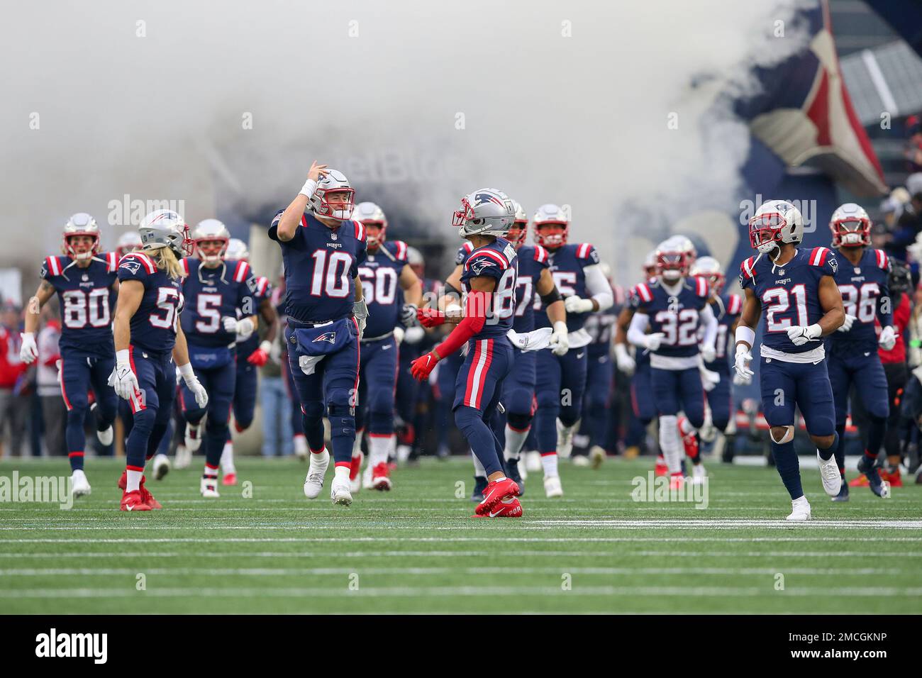 New England Patriots quarterback Mac Jones (10) and wide receiver