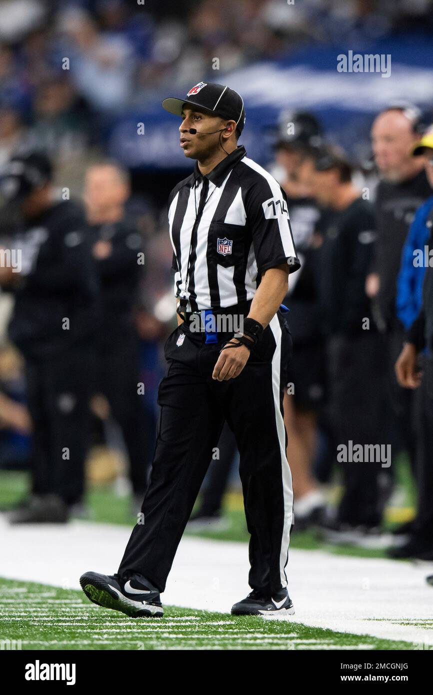 NFL side judge Dominique Pender (114) on the field during an NFL